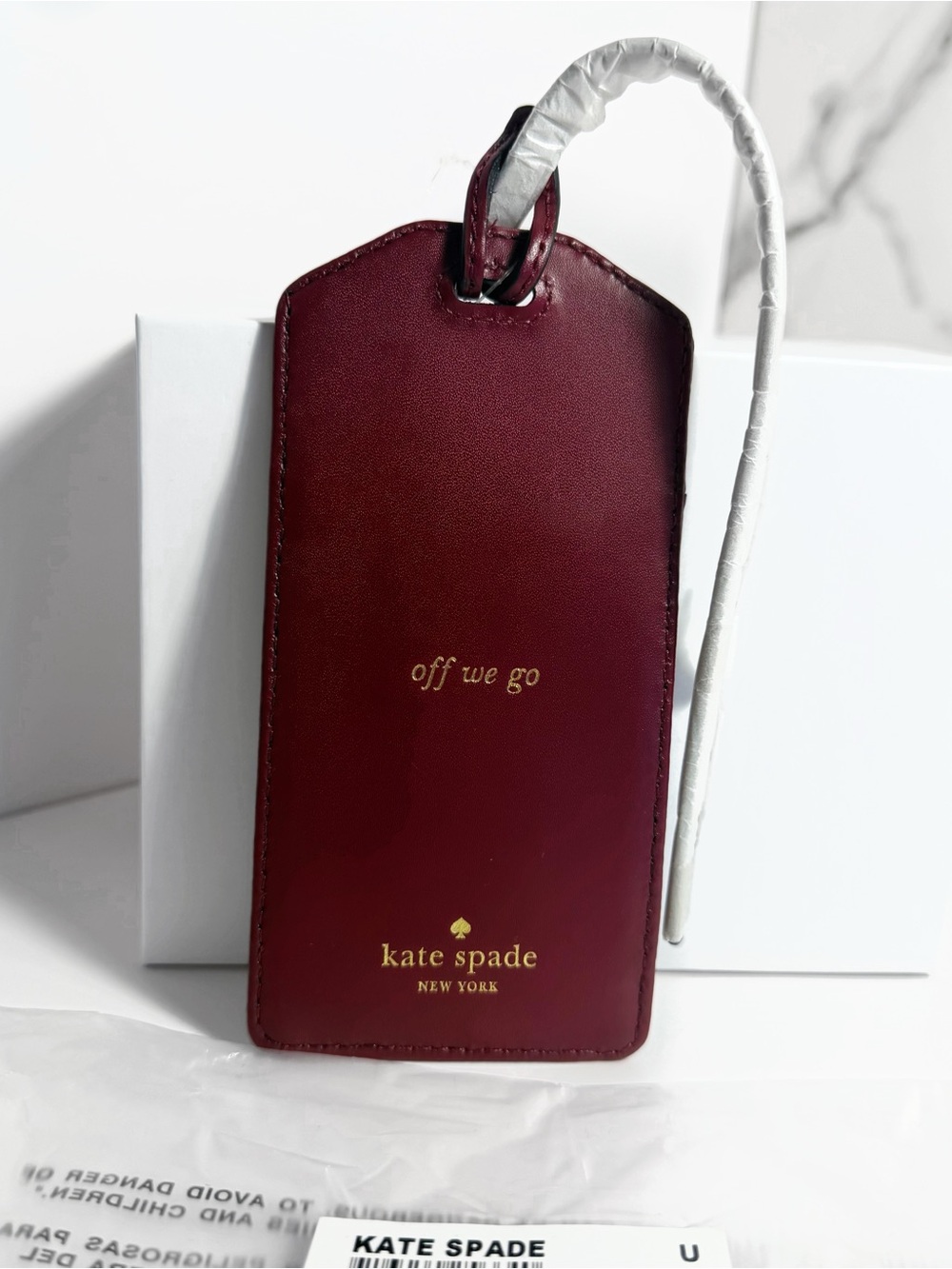 NWT Kate Spade “off we go” Merlot Leather Luggage Tag sealed original packaging